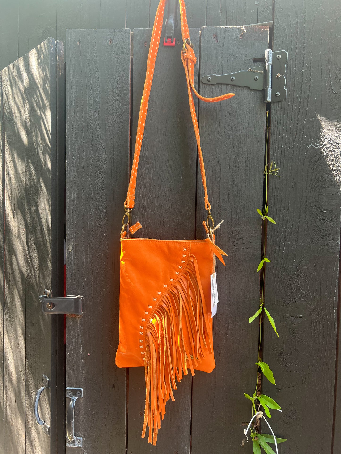 Pranee Austin "Holly" Fringe Crossbody Purse in Orange
